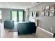 A cozy living room showcasing comfortable seating and stylish decor at 13447 Newport Shores Dr, Hudson, FL 34669
