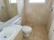 Bathroom with shower, toilet and vanity sink at 15645 Olney Ln, Spring Hill, FL 34610