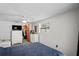 Spacious bedroom with ample closet space and a ceiling fan at 3423 Umber Rd, Holiday, FL 34691