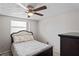 Bedroom with a bed, ceiling fan, and a dresser at 3423 Umber Rd, Holiday, FL 34691