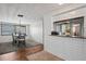 Dining room with gray table and chairs, hardwood floors at 3423 Umber Rd, Holiday, FL 34691