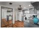 Modern gray kitchen with granite countertops and wood floors at 3423 Umber Rd, Holiday, FL 34691