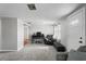 Living room with comfortable seating and a home office area at 3423 Umber Rd, Holiday, FL 34691