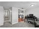 Open living room with view into kitchen and hallway at 3423 Umber Rd, Holiday, FL 34691