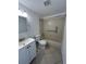 Clean bathroom with a bathtub and shower at 4933 Filner St # 4933, New Port Richey, FL 34652
