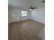 Living room with tile floors and ceiling fan at 4933 Filner St # 4933, New Port Richey, FL 34652