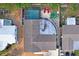 Aerial view showing home, pool, and surrounding landscape at 3423 Umber Rd, Holiday, FL 34691