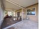 Spacious screened porch with access from inside at 10824 Peppertree Ln, Port Richey, FL 34668