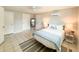 Bedroom with tile floor, ceiling fan, and natural light showcases comfortable living space at 4041 Las Vegas Dr, New Port Richey, FL 34653