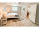 Bedroom featuring tile floor, ceiling fan and natural light offers a comfortable retreat at 4041 Las Vegas Dr, New Port Richey, FL 34653