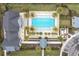 Aerial view of the community pool area, showcasing lush landscaping and comfortable lounging areas at 6120 Marsh Trail Dr, Odessa, FL 33556