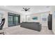 Relaxing bonus room featuring large sliding glass doors to the exterior at 6120 Marsh Trail Dr, Odessa, FL 33556