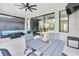 Relaxing outdoor patio with dining and seating area, perfect for entertaining guests at 6120 Marsh Trail Dr, Odessa, FL 33556