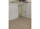 A bedroom that includes ceiling fan and closet space at 7240 Nova Scotia Dr, Port Richey, FL 34668