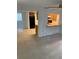 Bright living room featuring tile floors and a pass through to the kitchen, great for entertaining at 7240 Nova Scotia Dr, Port Richey, FL 34668