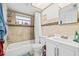 Clean bathroom featuring a shower/tub combo, toilet, and vanity with storage at 7240 Nova Scotia Dr, Port Richey, FL 34668