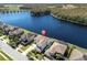 Two-story home with lake view in a quiet community at 12135 Crestridge Loop, Trinity, FL 34655