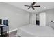 Bright bedroom with ensuite bathroom and barn door at 12135 Crestridge Loop, Trinity, FL 34655