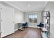 Home office with wood floors and modern furniture at 12135 Crestridge Loop, Trinity, FL 34655