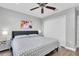 Spacious bedroom with king-size bed, a large closet, and modern decor at 12135 Crestridge Loop, Trinity, FL 34655