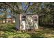 Small storage shed in backyard at 3018 Greynolds Ave, Spring Hill, FL 34608