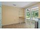 Breakfast nook with view of the pool and backyard at 3018 Greynolds Ave, Spring Hill, FL 34608