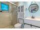 Clean bathroom with a shower and white vanity at 3018 Greynolds Ave, Spring Hill, FL 34608