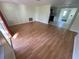 Spacious living room with hardwood floors at 5319 Whippoorwill Dr, Holiday, FL 34690