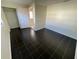 Bedroom with dark tile floors and built-in shelving at 5319 Whippoorwill Dr, Holiday, FL 34690