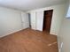 Bright bedroom with wood-look floors and ample closet space at 5319 Whippoorwill Dr, Holiday, FL 34690
