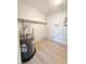 Laundry room with washer, dryer hookups and shelving at 4041 Las Vegas Dr, New Port Richey, FL 34653