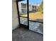 Screened porch with view of the community at 5521 Bay Blvd # 101, Port Richey, FL 34668