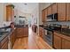 Updated kitchen with stainless steel appliances and granite countertops at 13517 Hunters Point St, Spring Hill, FL 34609