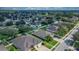 Wide aerial view showing the house and surrounding area at 13517 Hunters Point St, Spring Hill, FL 34609
