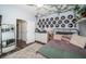 Cozy bedroom with unique decor and ample natural light; perfect for relaxation at 10595 Marsha Dr, New Port Richey, FL 34655