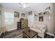 Comfortable bedroom with a sofa and large window bringing in natural light at 10595 Marsha Dr, New Port Richey, FL 34655