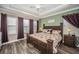 Spacious main bedroom featuring a decorative ceiling and plenty of natural light at 10595 Marsha Dr, New Port Richey, FL 34655