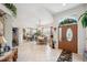 The foyer has a dining area and sidelight window showcasing an abundance of natural light at 1717 Daylily Dr, Trinity, FL 34655