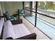 Relaxing screened porch with seating and outdoor space at 1775 Cupecoy Cir # O4, Lutz, FL 33558