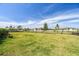 Dog park with grassy area and bench at 5230 Fiddle Fig Ave, Wimauma, FL 33598