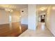 Bright entryway with hardwood and tile floors, leading to living areas at 6206 Soaring Ave, Temple Terrace, FL 33617