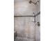 Large tiled shower with built-in seat and glass enclosure at 10595 Marsha Dr, New Port Richey, FL 34655
