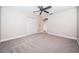 Spacious bedroom with ceiling fan and large closet at 7900 Hardwick Dr # 827, New Port Richey, FL 34653