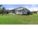 Large backyard with shed and screened porch at 1638 Swamp Rose Ln, Trinity, FL 34655