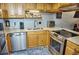 Well-equipped kitchen, offering ample cabinetry and stainless steel appliances at 1775 Cupecoy Cir # O4, Lutz, FL 33558