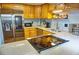 Modern kitchen boasting stainless steel appliances and granite countertops at 1775 Cupecoy Cir # O4, Lutz, FL 33558