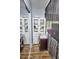White closet with mirrored doors and shoe storage at 1775 Cupecoy Cir # O4, Lutz, FL 33558