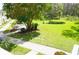Relaxing community with lush green space and walkways at 1775 Cupecoy Cir # O4, Lutz, FL 33558
