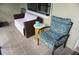 Cozy screened porch with seating for relaxing outdoors at 1775 Cupecoy Cir # O4, Lutz, FL 33558