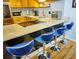 Modern kitchen with stainless steel appliances and breakfast bar at 1775 Cupecoy Cir # O4, Lutz, FL 33558